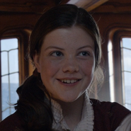 Lucy Pevensie en la trilogía de Las crónicas de Narnia, otro de sus personajes más conocidos y el primero de su carrera.