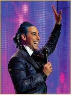 Caesar Flickerman en la saga de Los juegos del hambre.