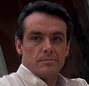 Alejandro Sosa (Paul Shenar) en Cara cortada (doblaje original).
