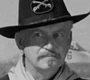 Mayor Dell Harney (Russell Hicks) en Mar de hierba