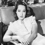 Mary Smith (Merle Oberon) en El vaquero y la dama.