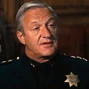 Jefe de policía en la 2ª versión de Harry el Sucio.