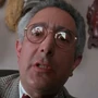 Dr. Arthur Neuman en La Máscara (versión 20th Century Fox).