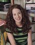 Kerry Hennessy (2ª voz) en 8 Simple Rules.