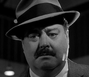 Maish Rennick (Jackie Gleason) en Réquiem para un luchador