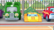 Green truck yellow racecar