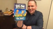 Dav Pilkey holding Dog Man: Mothering Heights (from The Today Show)
