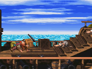 Diddy carrying a Crate in the first Pirate Ship level.