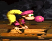 Dixie Kong blowing her bubble gum, as seen in the game Donkey Kong Country 2.