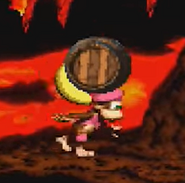 Dixie Kong carrying a Wooden Barrel using her ponytail, as seen in the game Donkey Kong Country 2.