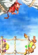 Diddy Kong jumping over a Klinger, as seen in the game Donkey Kong Country 2 for GBA.