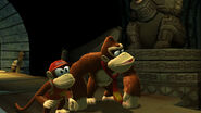 Donkey and Diddy Kong meeting Gong-Oh, as seen during a cutscene of the game Donkey Kong Country Returns for Wii.