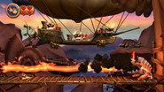 During the second phase, Thugly breathing fire at Donkey and Diddy Kong, as seen in the game Donkey Kong Country Returns for Wii.