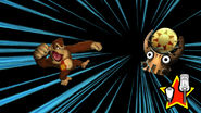 Donkey reading to punch Gong-Oh, as seen in the game Donkey Kong Country Returns for Wii.