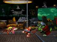 K. Rool Duel.png (1.35 MB) Dixie and Diddy are horrified when they witness Kaptain K. Rool attacking poor Donkey Kong.