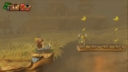 Donkey and Dixie Kong riding on Rambi, as seen in the game Donkey Kong Country: Tropical Freeze.