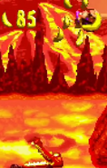 A red Krochead after throwing Dixie Kong upwards, as seen in the game Donkey Kong Country 2 for GBA.