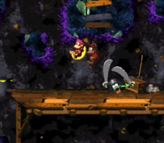 Green Kutlass after being defeated by Dixie Kong, as seen in the game Donkey Kong Country 2: Diddy's Kong Quest for for SNES.