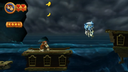 Donkey and Diddy Kong next to a glimmering Jellybob, as seen in the Beach level Stormy Shore of the game Donkey Kong Country Returns for Wii.