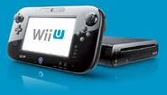 The Game Pad (left) alongside the Nintendo Wii U console (right).