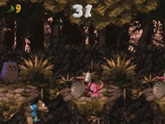 Koindozer Klamber Bonus.png (1.51 MB) A Koindozer knocks Kiddy off the ledge in the Bonus room.