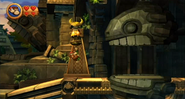 Open entrance of giant Toothberry statue at the beginning of the level (Wii version).