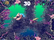 Green Banana Bonus.png (1.28 MB) Kiddy and Dixie about to collect a green banana in the Bonus Stage (underwater).
