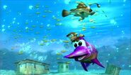 A fish resembling Glimmer the Anglerfish next to Diddy Kong riding Enguarde on some sunken ruins.