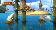 Two Yellow Snaggles jumping out of the water as seen in the game Donkey Kong Country Returns for Wii.