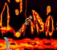 Dixie Kong crossing over the lava pit of the boss arena by using hooks, as seen in the game Donkey Kong Country 2: Diddy's Kong Quest for SNES.