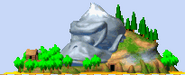 Plano de fundo exibindo a Ilha Donkey Kong do jogo de corrida cancelado Diddy Kong Pilot.