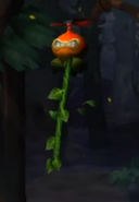 Small-sized Wigglevine about to break its vine as seen in the game Donkey Kong Country Returns for Wii.