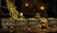 The Mole Miners filling the Mine Carts with DK and Diddy's bananas.