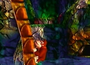 Donkey Kong climbing up a tree.