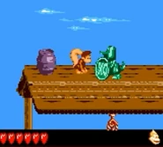 Dixie Kong next to Koin as seen in the game Donkey Kong GB: Dinky Kong & Dixie Kong for Game Boy Color.