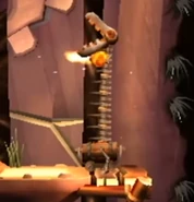 Firehead Ned extending its spines and spitting a fireball, as seen in the game Donkey Kong Country Returns for Wii.