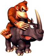 Artwork of Donkey Kong riding on Rambi from the game Donkey Kong Country.