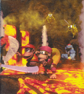 Artwork of Diddy and Dixie Kong in a lava cave, faced by multiple enemies.