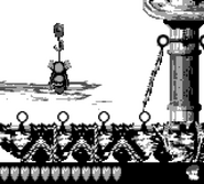 Diddy Kong hanging on a Hook in order to reach a high platform, as seen in the game Donkey Kong Land 2 for Game Boy.