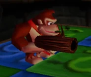 DK wielding the Coconut Shooter in Frantic Factory.