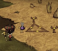 The "Give" prompt that appears when placing a Purple Gem in one of the stands.