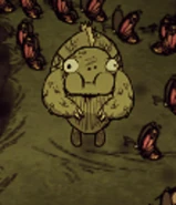 魚人正在吃蝴蝶翅膀。