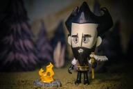 A special edition figure of Wilson with a Beard, Log Suit, Razor and Fire Pit.