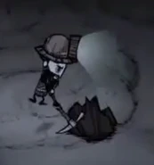 Wilson minando dentro de una cueva.