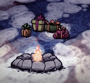 GiftsScreenshot.png (461 KB) Several gifts of different sizes placed around a Fire Pit.