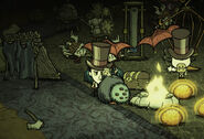 Glommer durmiendo junto al fuego en Don't Starve Together.