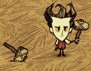 Wilson Hammer.jpg (59 KB) Wilson standing next to a Hammer, while holding one.