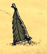 Thatch Sail dropped on land.