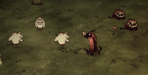 Pigs fighting Red Hounds at the staff trap.