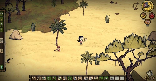 Serpent rayé rouge suivant Willow sur la plage